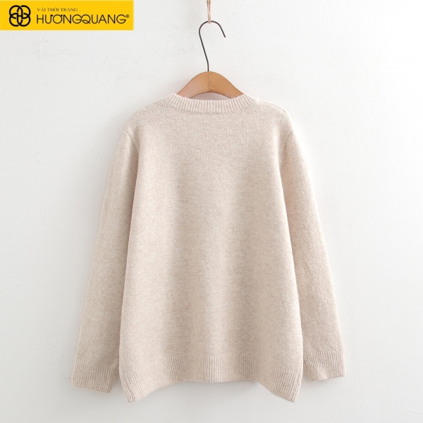 Cận cảnh vải dệt kim co giãn màu sáng, hiện rõ cấu trúc vòng sợi mềm mại